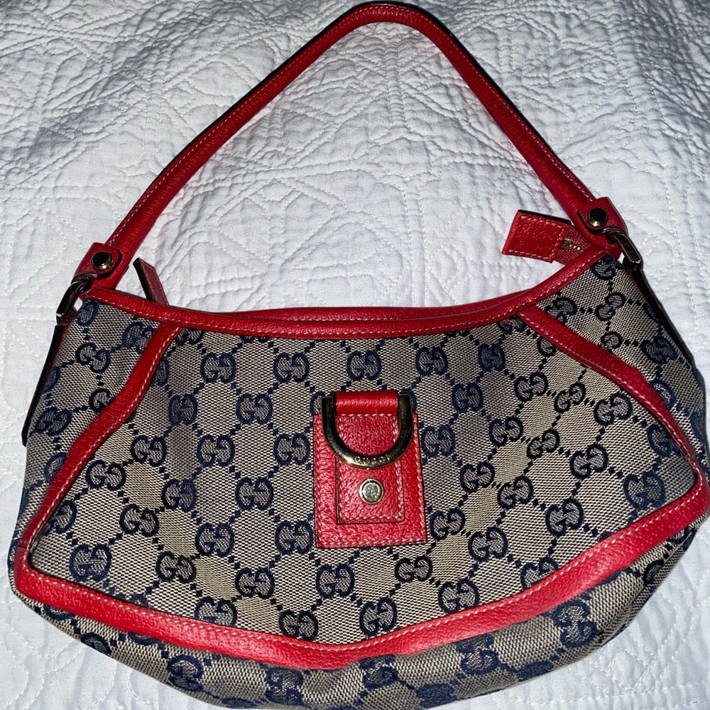 GG Canvas Abbey D-Ring
Pochette